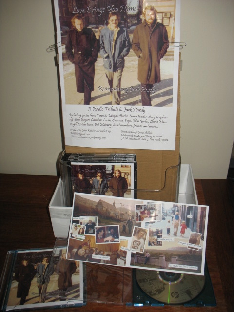 [Love Brings You Home poster and CDs]