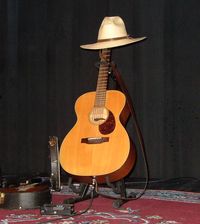 [Jack's guitar and hat]